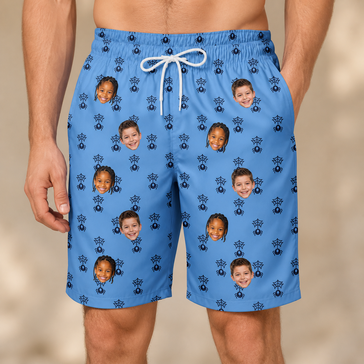 Model wearing Men's Orb Weaver Custom Face Beach Shorts printed with kids' faces