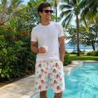 Real-life photo of someone wearing Men's Threaded Thrills Custom Face Beach Shorts — custom faces printed all-over