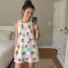 Real-life photo of someone wearing Women's Threaded Thrills Custom Face Tank Dress — custom faces printed all-over