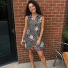 Real-life photo of someone wearing Women's Ectoplasm Eccentrics Custom Face V-Neck Dress — custom faces printed all-over