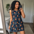 Real-life photo of someone wearing Women's Grim Gridwork Custom Face Tank Dress — custom faces printed all-over
