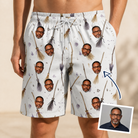 Man wearing Men's Cackle Commuters Custom Face Beach Shorts — custom faces printed all-over
