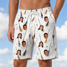 Model wearing Men's Cackle Commuters Custom Face Beach Shorts printed with kids' faces
