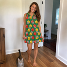 Full-length photo with the pet printed all over this Women's Ringing Revelry Custom Cat Face V-Neck Dress