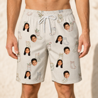 Model wearing Men's Santa Satchels Custom Face Beach Shorts printed with kids' faces