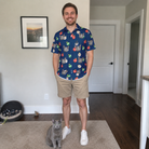 Full-length photo with the pet printed all over this Men's December Dangles Custom Cat Face Polo Shirt