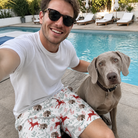 Selfie with the pet whose face is printed all over this Men's Prancer Pranks Custom Dog Face Beach Shorts