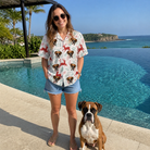 Full-length photo with the pet printed all over this Women's Prancer Pranks Custom Dog Face Hawaiian Shirt