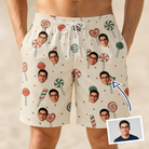 Man wearing Men's Candy Constellation Custom Face Beach Shorts — custom faces printed all-over