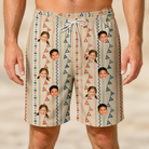 Model wearing Men's Pennant Parade Custom Face Beach Shorts printed with kids' faces
