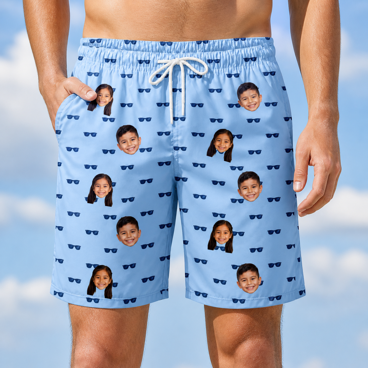 Model wearing Men's Flirt Filters Custom Face Beach Shorts printed with kids' faces