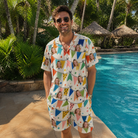 Real-life photo of someone wearing Men's Tulle Tumble Custom Face Shirt & Shorts Set — custom faces printed all-over
