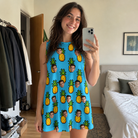 Real-life photo of someone wearing Women's Pineapple Pals Custom Face Tank Dress — custom faces printed all-over