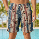 Model wearing Men's Deckchair Daydream Custom Face Beach Shorts printed with kids' faces