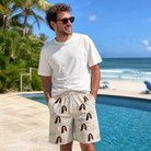 Real-life photo of someone wearing Men's Parasol Pals Custom Face Beach Shorts — custom faces printed all-over