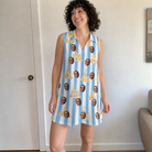 Real-life photo of someone wearing Women's Sandcastle Safari Custom Face V-Neck Dress — custom faces printed all-over