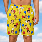 Model wearing Men's Crimson Cloudburst Custom Face Beach Shorts printed with kids' faces