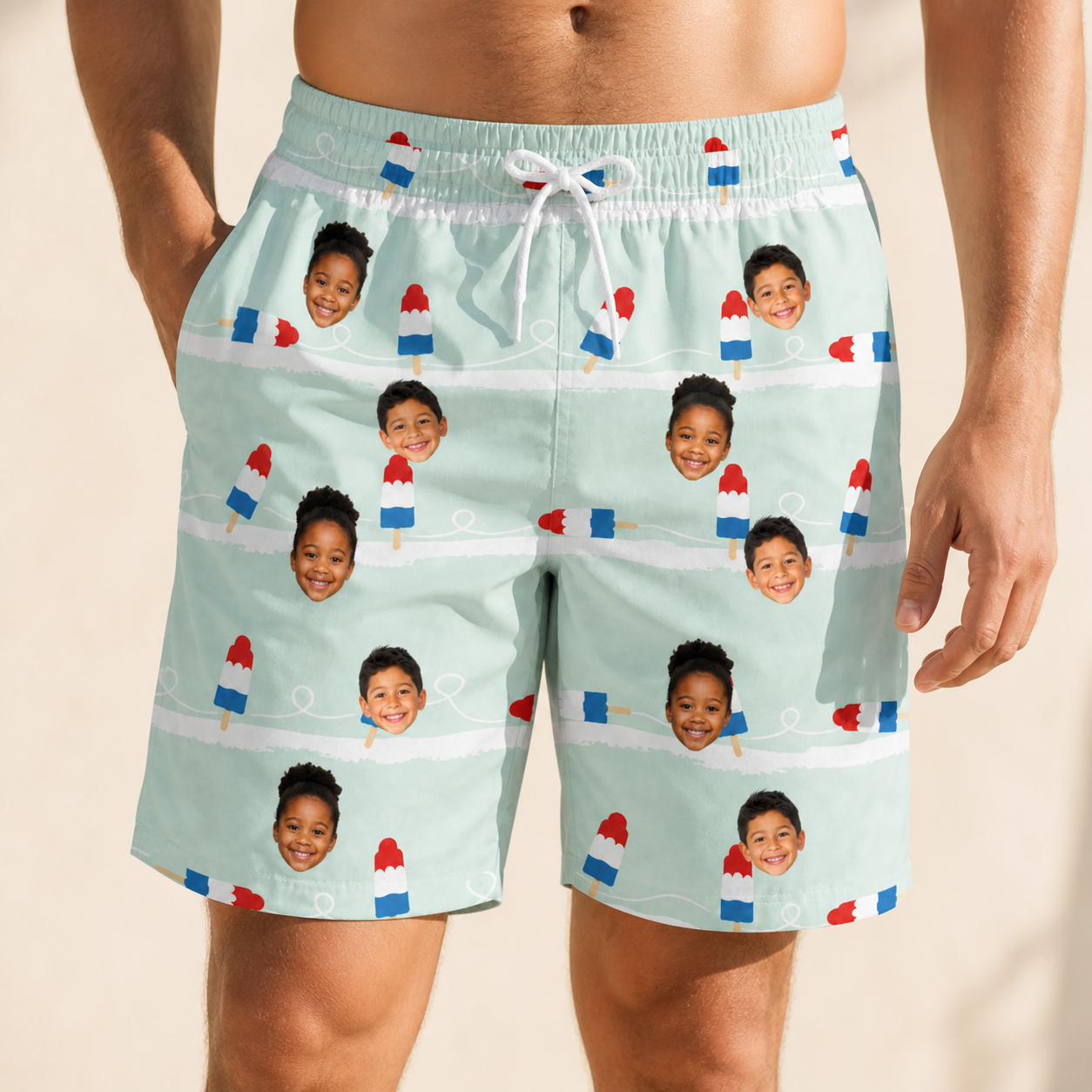 Model wearing Men's Independence Icicles Custom Face Beach Shorts printed with kids' faces