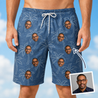 Man wearing Men's Aloha Arbor Custom Face Beach Shorts — custom faces printed all-over