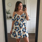Real-life photo of someone wearing Women's Flora Fiesta Custom Face Off-Shoulder Dress — custom faces printed all-over