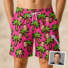 Man wearing Men's Sunset Plumeria Custom Face Beach Shorts — custom faces printed all-over