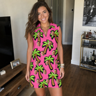 Real-life photo of someone wearing Women's Sunset Plumeria Custom Face V-Neck Dress — custom faces printed all-over