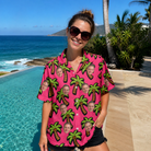 Real-life photo of someone wearing Women's Sunset Plumeria Custom Face Hawaiian Shirt — custom faces printed all-over