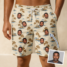 Man wearing Men's Botanical Breeze Custom Face Beach Shorts — custom faces printed all-over