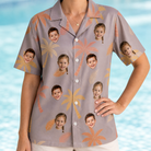 Model wearing Women's Leafy Lei Custom Face Hawaiian Shirt printed with kids' faces
