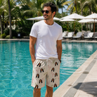 Real-life photo of someone wearing Men's Tropical Tippytoes Custom Face Beach Shorts — custom faces printed all-over
