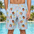 Model wearing Men's Flamingo Fizz Custom Face Beach Shorts printed with kids' faces