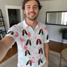 Real-life photo of someone wearing Men's Pink Pours Custom Face Polo Shirt — custom faces printed all-over
