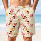 Model wearing Men's Hibiscus Hustle Custom Face Beach Shorts printed with kids' faces