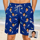 Man wearing Men's Lure Lore Custom Face Beach Shorts — custom faces printed all-over