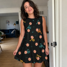 Real-life photo of someone wearing Women's Spool Foolery Custom Face Tank Dress — custom faces printed all-over