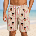 Model wearing Men's Waddle Wink Custom Face Beach Shorts printed with kids' faces