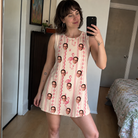Real-life photo of someone wearing Women's Waddle Wink Custom Face Tank Dress — custom faces printed all-over