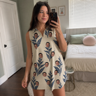 Real-life photo of someone wearing Women's Scarlet Spikes Custom Face V-Neck Dress — custom faces printed all-over