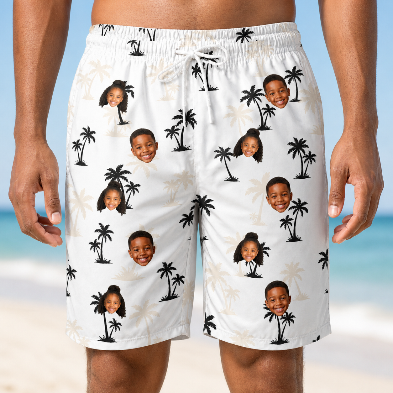 Model wearing Men's Tropic Tangle Custom Face Beach Shorts printed with kids' faces