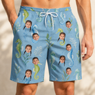 Model wearing Men's Sea Pony Society Custom Face Beach Shorts printed with kids' faces