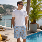 Real-life photo of someone wearing Men's Aquatic Antics Custom Face Beach Shorts — custom faces printed all-over