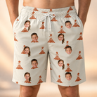 Model wearing Men's Magma Mambo Custom Face Beach Shorts printed with kids' faces