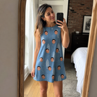 Real-life photo of someone wearing Women's Retro Riptide Custom Face Tank Dress — custom faces printed all-over