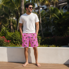 Real-life photo of someone wearing Men's Vintage Volcano Custom Face Beach Shorts — custom faces printed all-over
