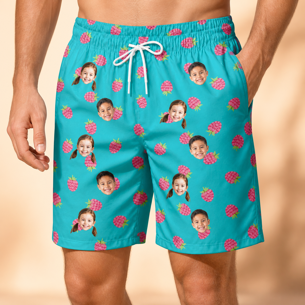 Model wearing Men's Razzle Riot Custom Face Beach Shorts printed with kids' faces