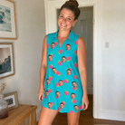 Real-life photo of someone wearing Women's Razzle Riot Custom Face V-Neck Dress — custom faces printed all-over