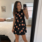 Real-life photo of someone wearing Women's Peach Please Custom Face Tank Dress — custom faces printed all-over