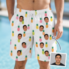 Man wearing Men's Tangy Tresses Custom Face Beach Shorts — custom faces printed all-over