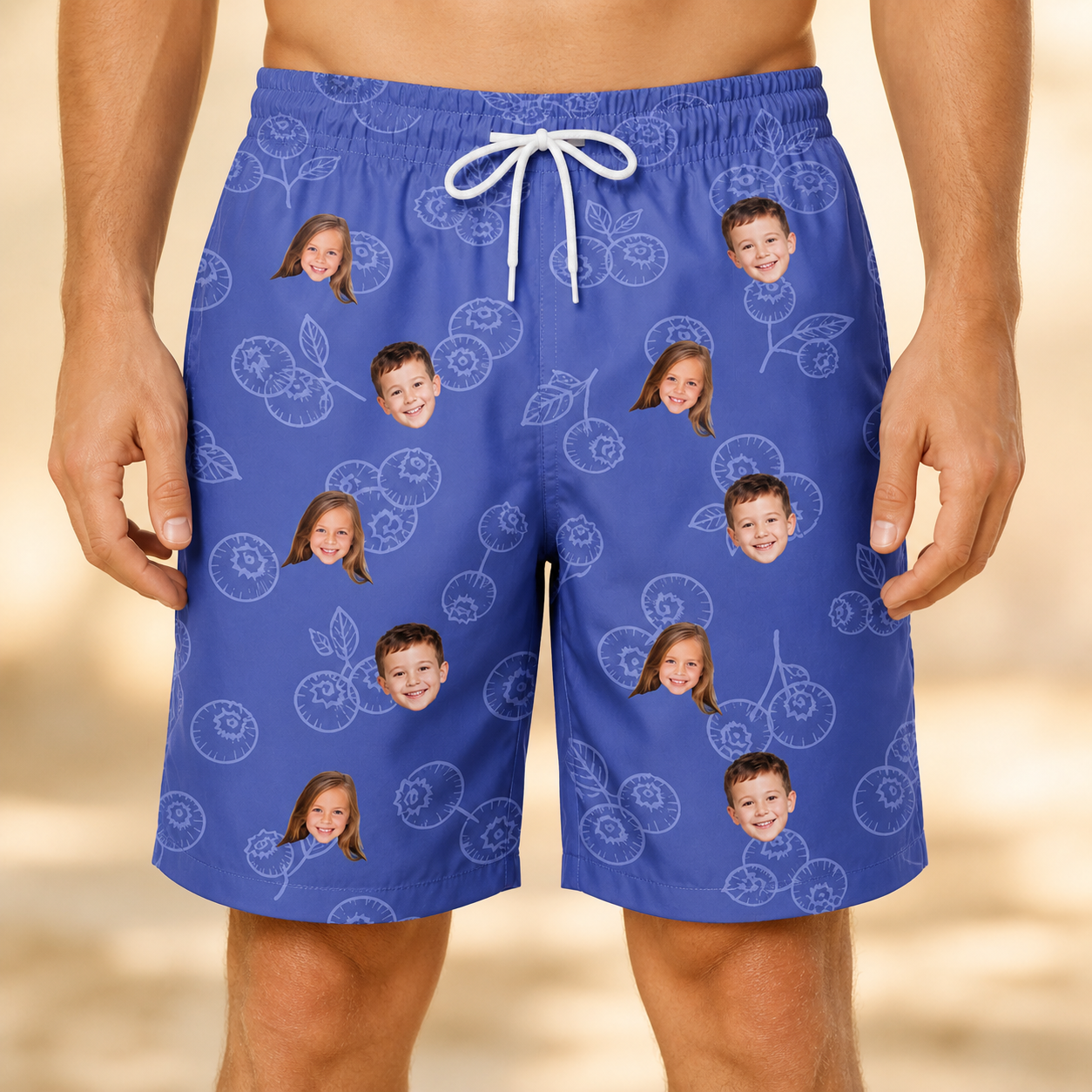 Model wearing Men's Blueberry Boogie Custom Face Beach Shorts printed with kids' faces