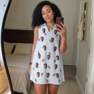 Real-life photo of someone wearing Women's Berry Merry Custom Face V-Neck Dress — custom faces printed all-over